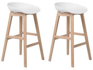 Set di 2 sgabelli da bar in legno chiaro e plastica bianca da 85 cm con sedile da bancone Beliani