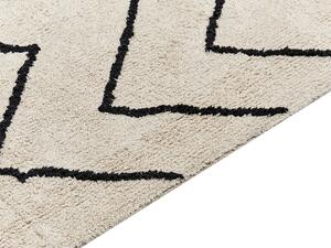 Tappeto geometrico cotone trapuntato con nappe 160x230 cm beige e nero soggiorno camera da letto Beliani