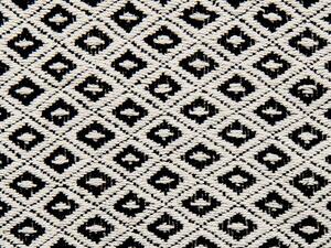 Coperta cotone fatta a mano con motivo geometrico e nappe bianco e nero plaid copriletto soggiorno camera da letto divano 125 x 150 cm Beliani