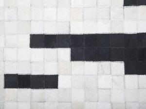 Tappeto tappetino Pelle Bovina Nera e Bianca 160 x 230 cm Rettangolare Motivo Geometrico Astratto Fatto a mano Beliani