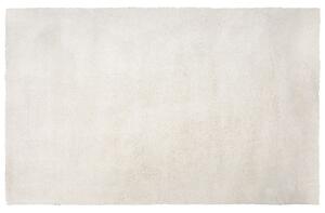Tappeto shaggy in misto cotone e poliestere bianco 140 x 200 cm soffice pelo denso Beliani