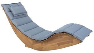 Lettino prendisole a doghe in legno di acacia chiaro con design a dondolo a forma curva con cuscino di seduta blu Beliani
