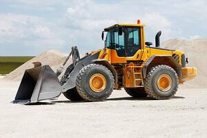 Illustrazione Yellow front loader at gravel pits, jordan_rusev