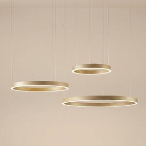 Lampada LED a sospensione Quitani Aureon, oro, Ø 80 cm, dimmerabile, CCT Aureon Quitani, dimmerabile, Ottone / Oro, Soggiorno / Sala da pranzo, Alluminio, Moderno