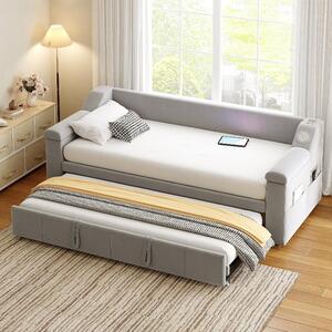 Divano letto 90x190 cm, estendibile a 180x190 cm, rivestito in velluto color grigio chiaro, dotato di sistema stereo Bluetooth, porta USB per la ricarica e vani portaoggetti
