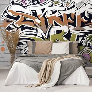 Carta da parati – Scritta Street Art arancione con spray