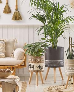Supporto per piante in magnesio rotondo in legno massello base rustica in stile africano alto vaso per piante Beliani