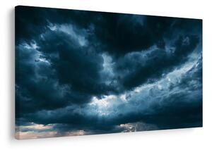 Quadro su tela – Nuvole temporalesche drammatiche sul paesaggio