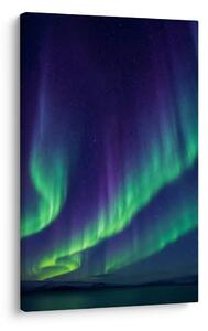 Quadro su tela – Bagliore verde e viola nel cielo notturno