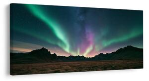 Quadro su tela – Aurora colorata sul paesaggio