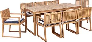 BELIANI Set da pranzo da giardino in legno di acacia chiaro tavolo 8 sedie con cuscini blu scuro e bianchi stile rustico da esterno
