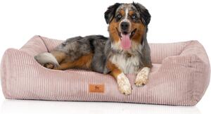 Culla per cani Cuddle Wuff in velluto a coste con aspetto intrecciato a mano Olivia M-L 85 x 63 cm rosa