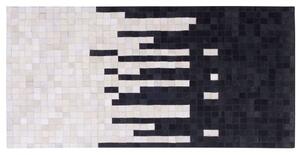 Tappeto tappetino Pelle Bovina Nera e Bianca 80 x 150 cm Rettangolare Motivo Geometrico Astratto Fatto a Mano Beliani