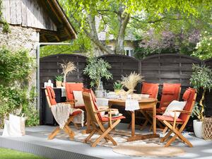 Set da pranzo per esterni in legno di acacia chiaro con cuscini rossi tavolo a 8 posti sedie pieghevoli design rustico Beliani
