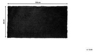 Tappeto shaggy in cotone Nero misto poliestere 80 x 150 cm soffice pelo lungo Beliani