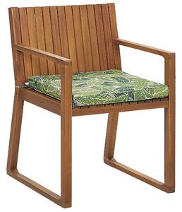 Set da pranzo da giardino 9 pezzi in legno di acacia chiaro 8 sedie con cuscini di seduta motivo foglia verde Beliani