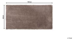 Tappeto Shaggy in cotone marrone chiaro in misto poliestere 80 x 150 cm soffice pelo denso Beliani