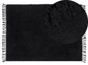 Tappeto rettangolare in cotone nero 140 x 200 cm con frange boho soggiorno camera da letto Beliani