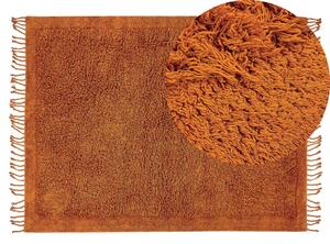 Tappeto rettangolare in cotone arancione 140 x 200 cm con frange boho soggiorno camera da letto Beliani