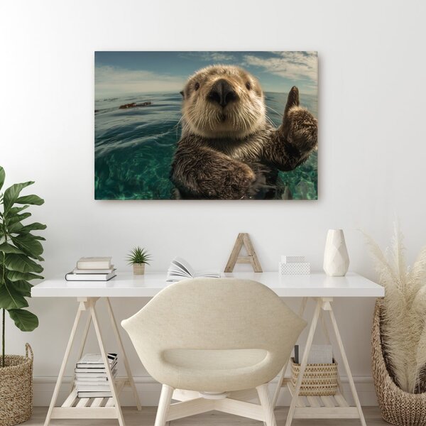 Quadro su tela – Lontra giocosa nell'oceano