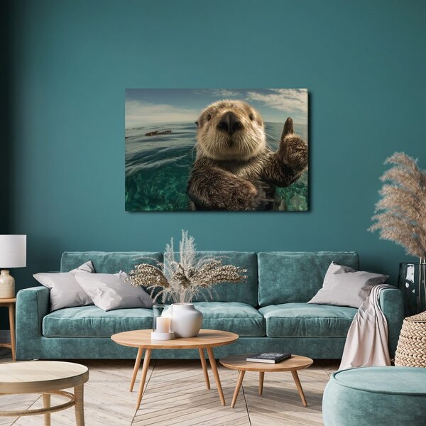Quadro su tela – Lontra giocosa nell'oceano