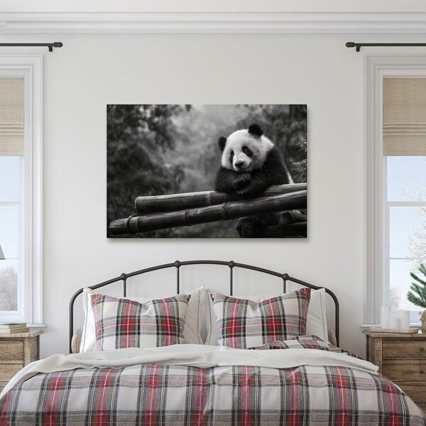 Quadro su tela – Panda che riposa sul bambù