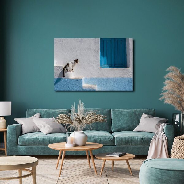 Quadro su tela – Gatto sui gradini blu