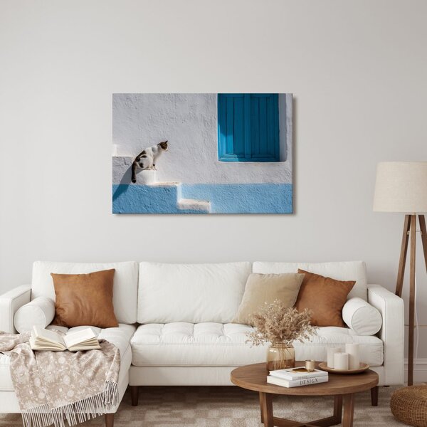 Quadro su tela – Gatto sui gradini blu