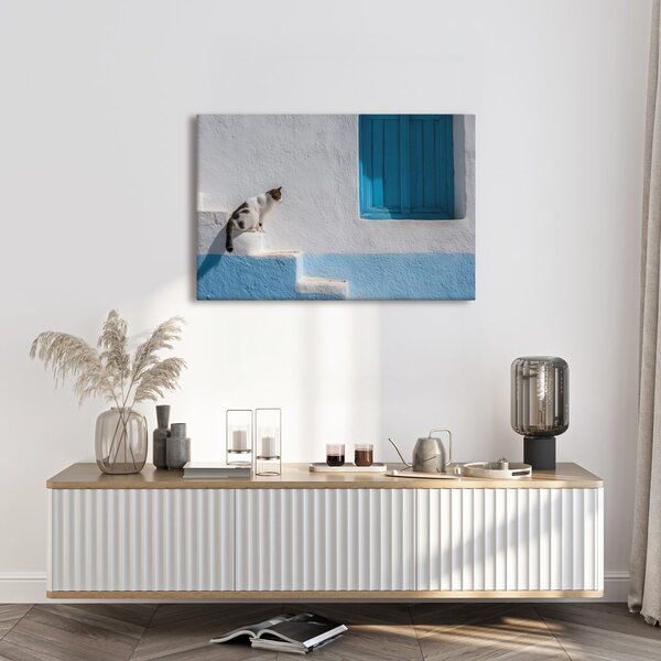 Quadro su tela – Gatto sui gradini blu