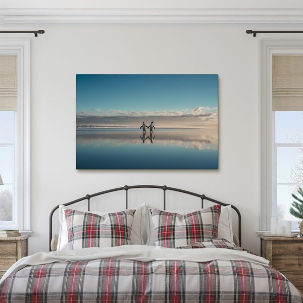 Quadro su tela – Pinguini su costa tranquilla