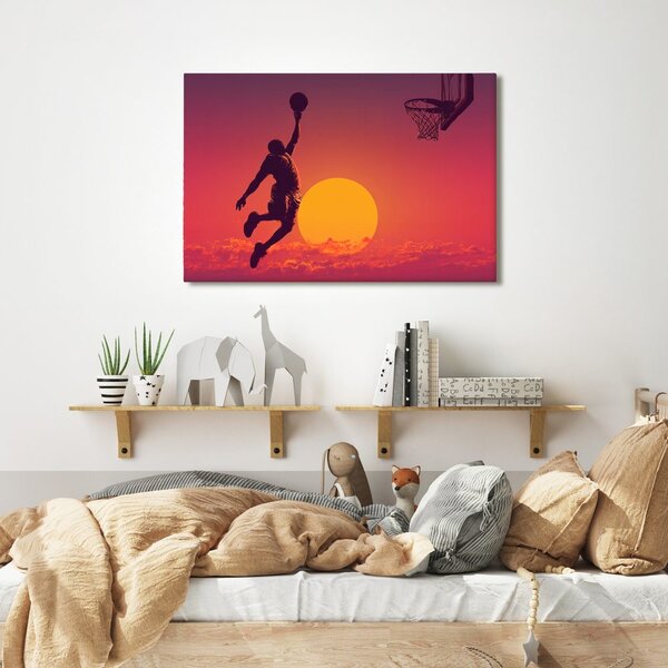 Quadro su tela – Giocatore di basket al tramonto dorato