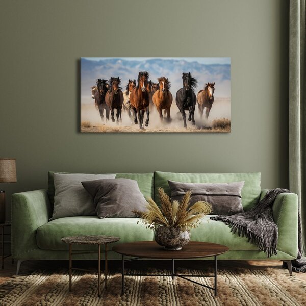 Quadro su tela – Mandria di cavalli in movimento
