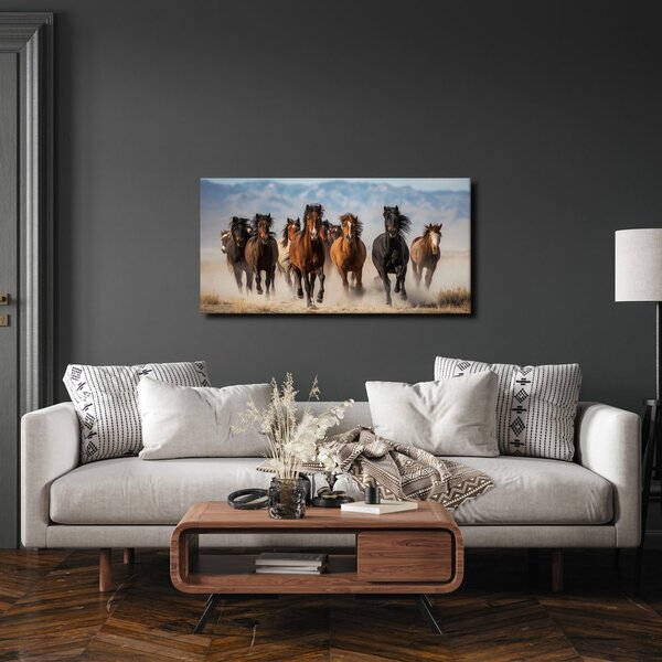 Quadro su tela – Mandria di cavalli in movimento