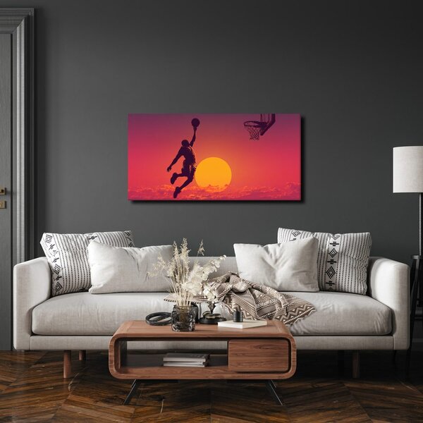Quadro su tela – Giocatore di basket al tramonto