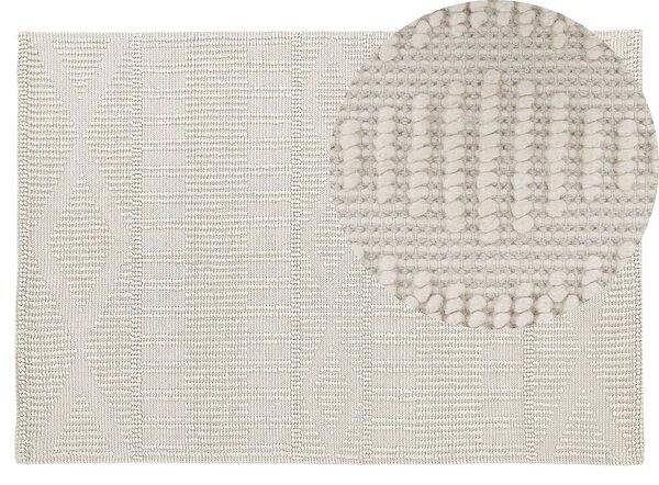 Tappeto di zona beige chiaro lana poliestere 140 x 200 cm intrecciato a mano motivo geometrico boho soggiorno camera da letto Beliani
