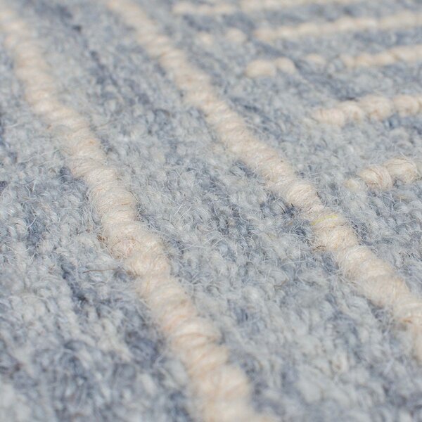 Tappeto in lana blu chiaro tessuto a mano 120x170 cm Memphis Wool - Flair Rugs