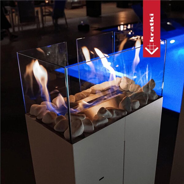 Camino Bioetanolo da Terra ROMEO T�V bianco Dimensioni 35,9x20,9x h 113 cm - peso 19 kg Certificato ISO 9001 permette di ammirare il fuoco da quattro lati, bianco