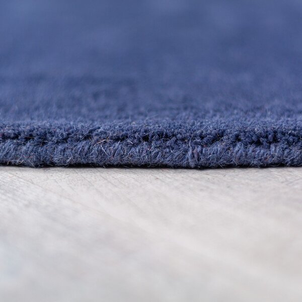 Tappeto rotondo blu in lana tessuto a mano ø 150 cm Mia Segment – Flair Rugs