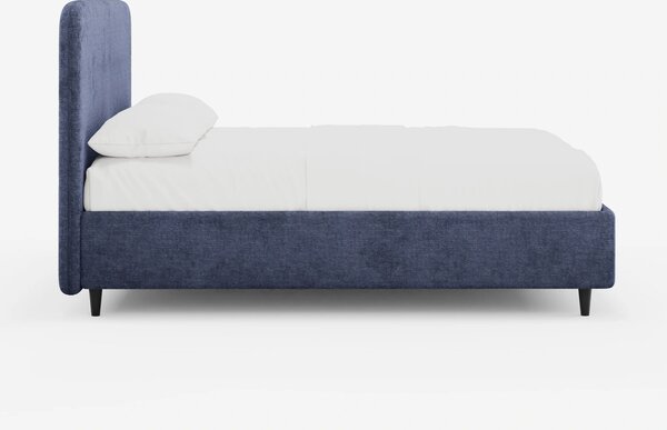 KAELOS letto minimal imbottito - vano contenitore, piedi alti e testie