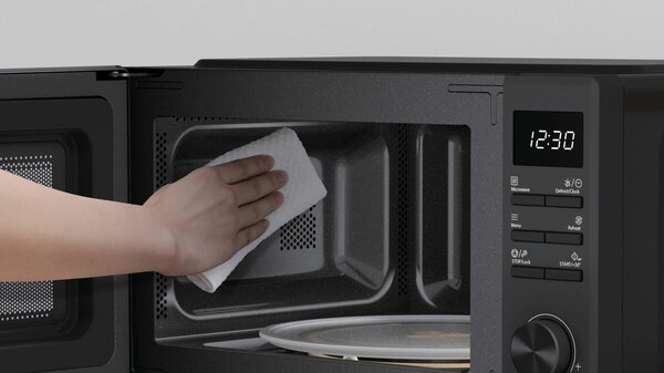 Candy Forno Microonde Combinato con Grill Capacit 20 Litri Potenza 700 Watt con Timer colore Nero - CMW520GDB 011