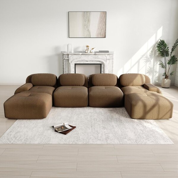Divano modulare a forma di "U", senza necessità di montaggio, realizzato in tessuto corduroy, dimensioni 388x178x70 cm, colore marrone. Angolo relax ideale per chi ha animali domestici, con ampi braccioli