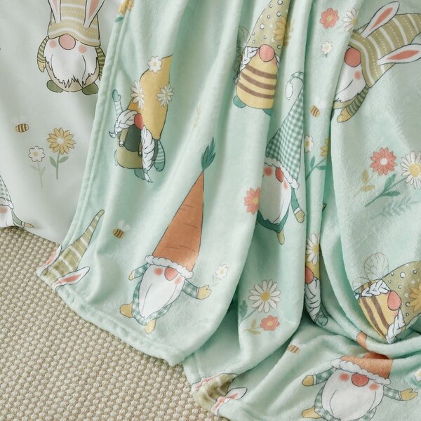 Coperta verde chiaro in micropile a tema pasquale 130x170 cm Spring Gonks – Catherine Lansfield