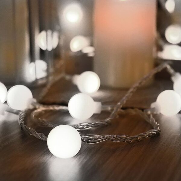 Catena decorata con 60 Perle a Led Bianco Freddo 9 metri cavo trasparente a batteria Wisdom