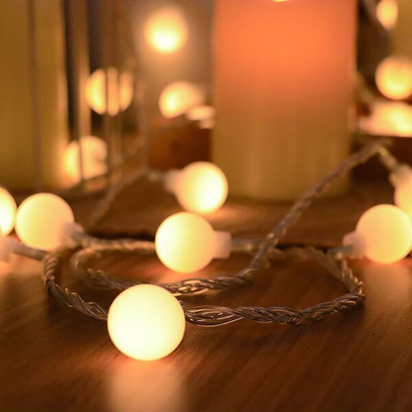Catena decorata con 60 Perle a Led Bianco Caldo 9 metri cavo trasparente a batteria Wisdom