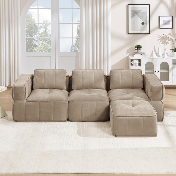 Divano modulare a forma di L, per 3 persone, senza struttura a vista, con poggiapiedi, rivestito in poliestere color sabbia, dimensioni 271x162x67 cm, imbottitura in schiuma 32D, capacità di carico fino a 750 kg