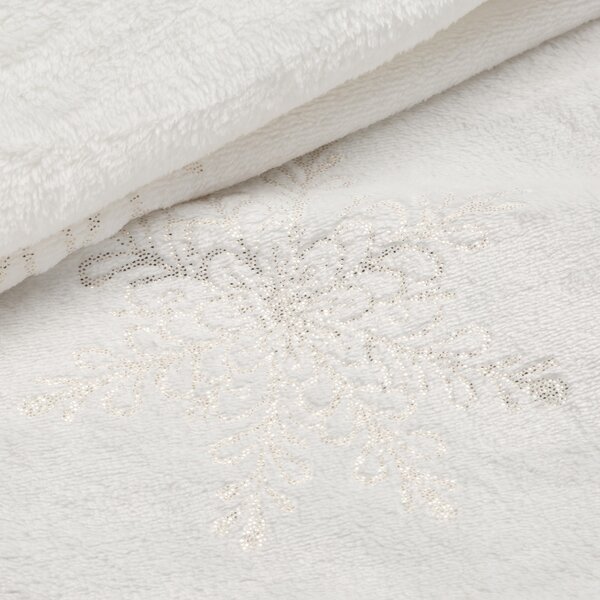 Coperta natalizia con fiocchi di neve
