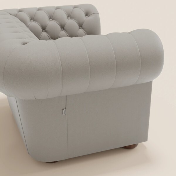 Chester Poltrona in vera pelle spessorata con capitonné artigianale