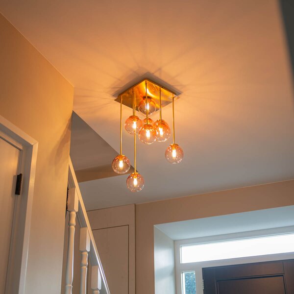 Lampadario Art Déco oro con vetro rosa 9 luci - Athenas