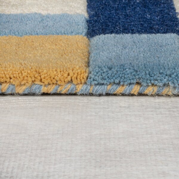 Tappeto blu in lana tessuto a mano 120x170 cm Kai Wool Border - Flair Rugs