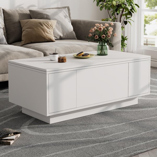 Tavolino da divano, dimensioni 100 x 50 x 43 cm, realizzato in pannello di particelle rivestito in bianco, dotato di un meccanismo di sollevamento a doppio sistema, vano contenitore nascosto e 2 ante